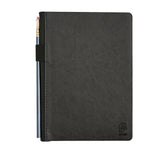 A dark gray textured Blackwing Planner with a black elastic band holding a Blackwing 602 pencil, shown on a plain white background.