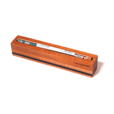 A wooden box containing a Blackwing Flat Single Tube Display.