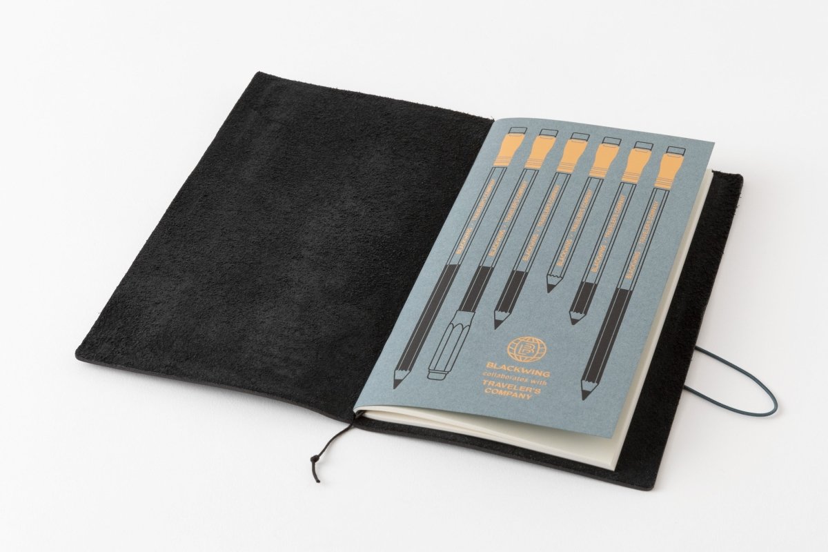 Blackwing X TRAVELER'S COMPANY notebook refill featuring a soft blue cover with gold foil pencils imprinted
