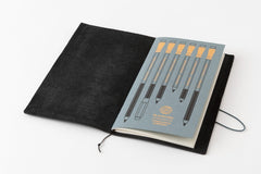 Blackwing X TRAVELER'S COMPANY notebook refill featuring a soft blue cover with gold foil pencils imprinted