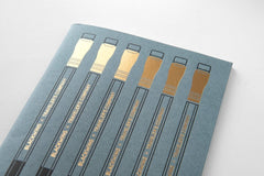 Blackwing X TRAVELER'S COMPANY notebook refill featuring pencils imprinted with gold foil