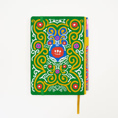 Back of a hardcover notebook with a vibrant green cover decorated with a colorful, symmetrical mandala-style illustration. The notebook features a matching pencil in the side pencil holster, set against a plain white background.