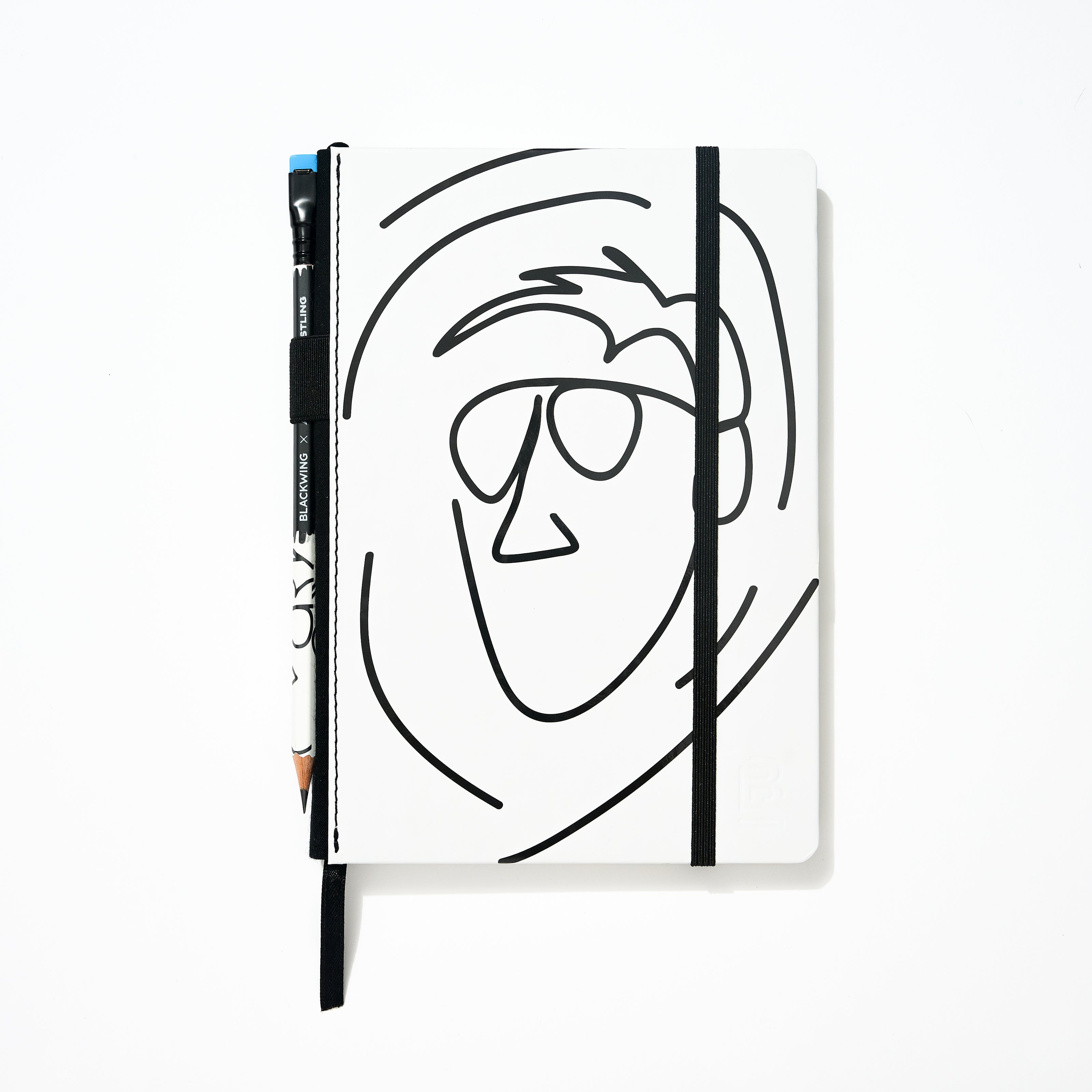 Blackwing x AEW "Freshly Squeezed" Orange Cassidy Notebook with a minimalist black line drawing of a face on a white cover