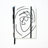 Blackwing x AEW "Freshly Squeezed" Orange Cassidy Notebook with a minimalist black line drawing of a face on a white cover