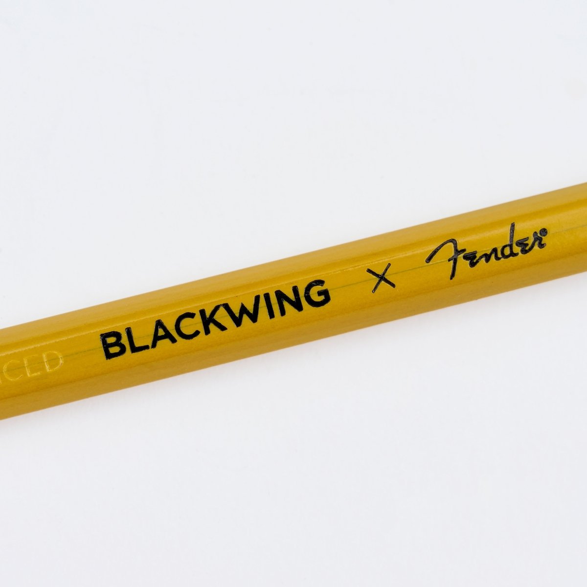 A close-up of a yellow Blackwing x Fender pencil from the butterscotch collection, showing the 'BLACKWING x Fender' branding printed in black, on a clean white background.